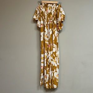 Gorgeous Ava Sky Jumper in mustard with beautiful white and pink orchid print.